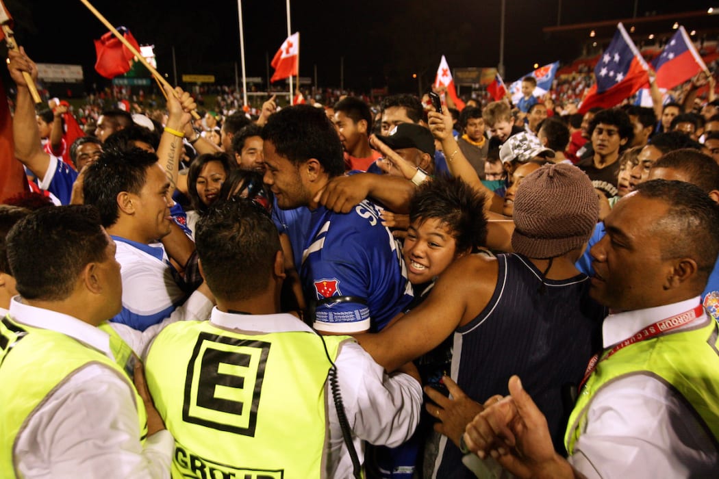 Tony Puletua celebrates with the crowd.
