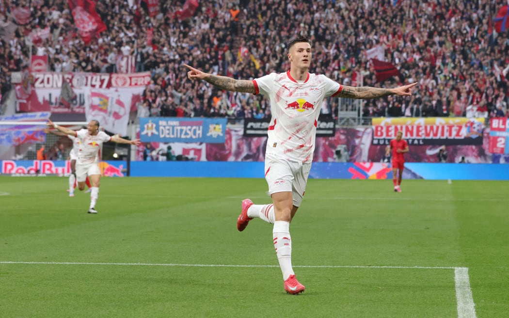 Benjamin Sesko after scoring a goal for RB Leipzig.