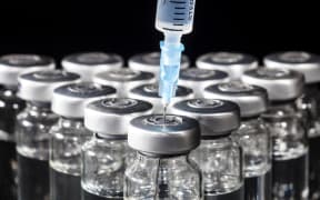 Medicine in vial and syringe.