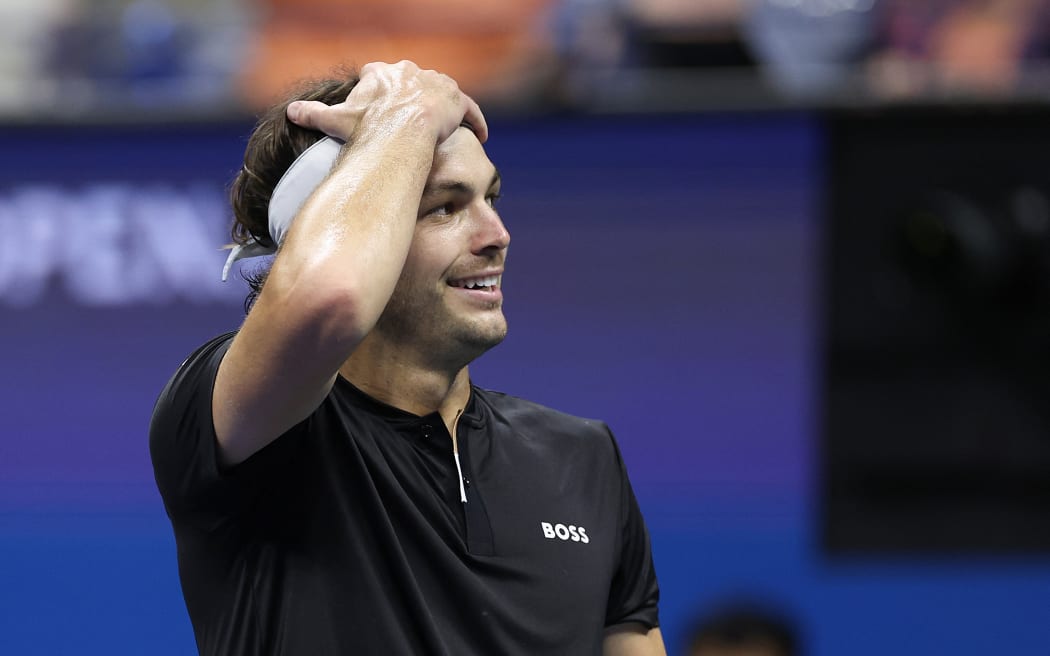 NEW YORK, NEW YORK - SEPTEMBER 06: Taylor Fritz of the United States celebrates after defeating Frances Tiafoe of the United States in their Men's Singles Semifinal match on Day Twelve of the 2024 US Open at USTA Billie Jean King National Tennis Center on September 06, 2024 in the Flushing neighborhood of the Queens borough of New York City.   Sarah Stier/Getty Images/AFP (Photo by Sarah Stier / GETTY IMAGES NORTH AMERICA / Getty Images via AFP)