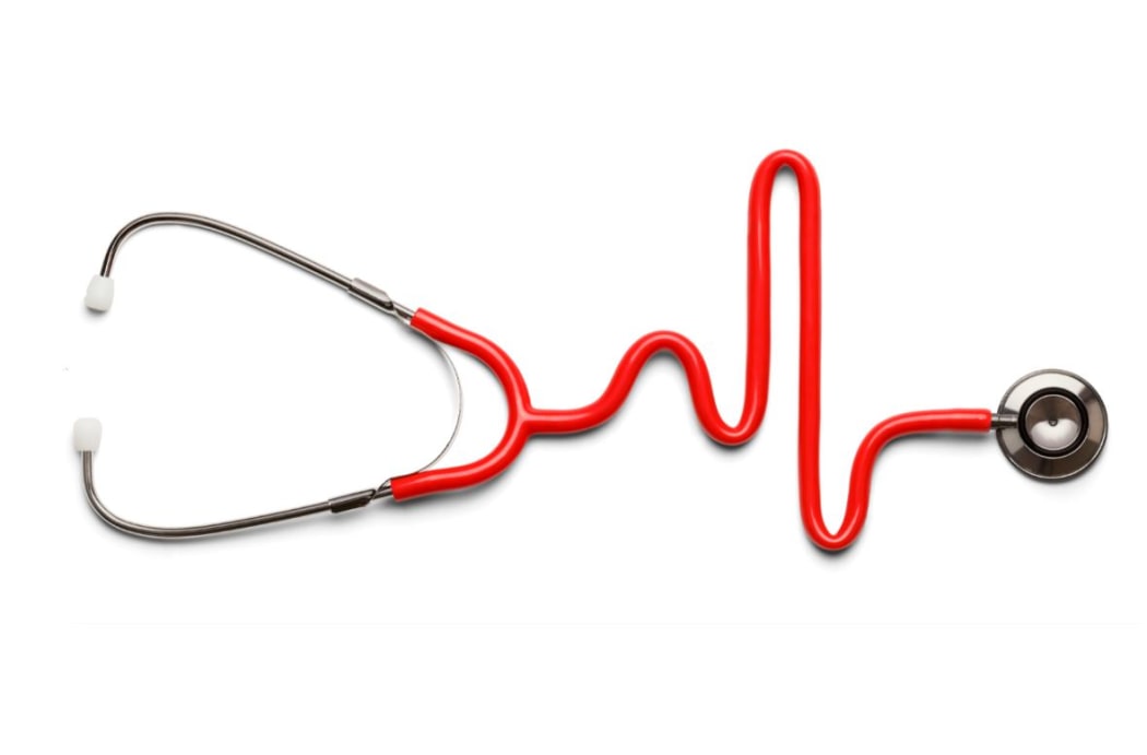Stethoscope in the shape of a Heart Beat on a EKG.