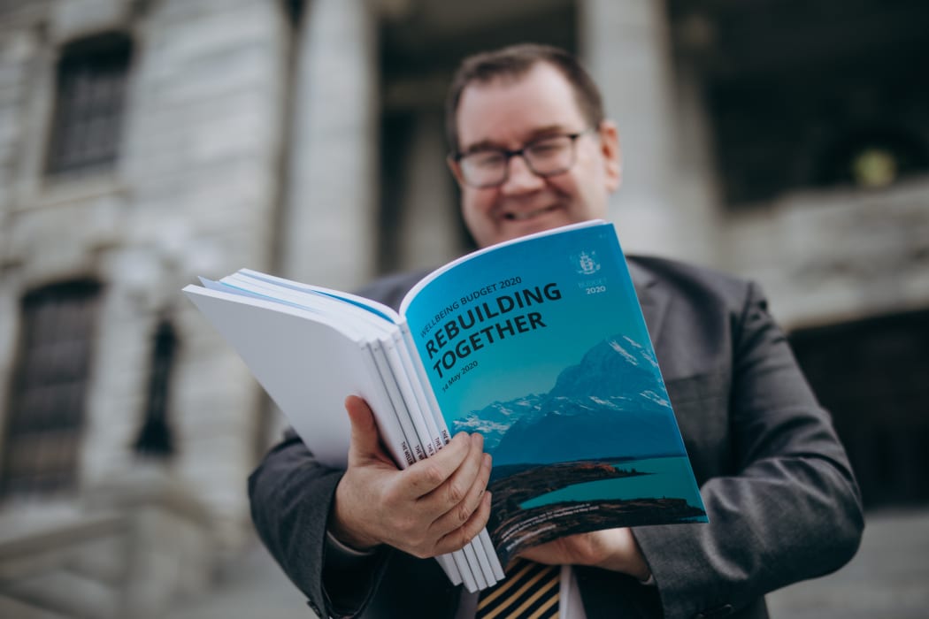 Grant Robertson holding the Budget 2020 ahead of its release.