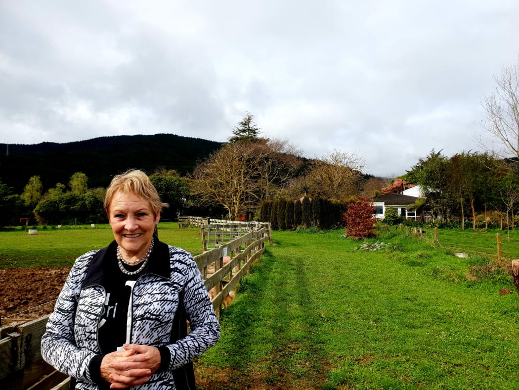 Jane Wood on her land in Manakau. She's one of many residents sick of waiting to hear whether the road will go ahead, and when.