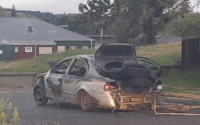 Burnt out car in Fordlands in Rotorua