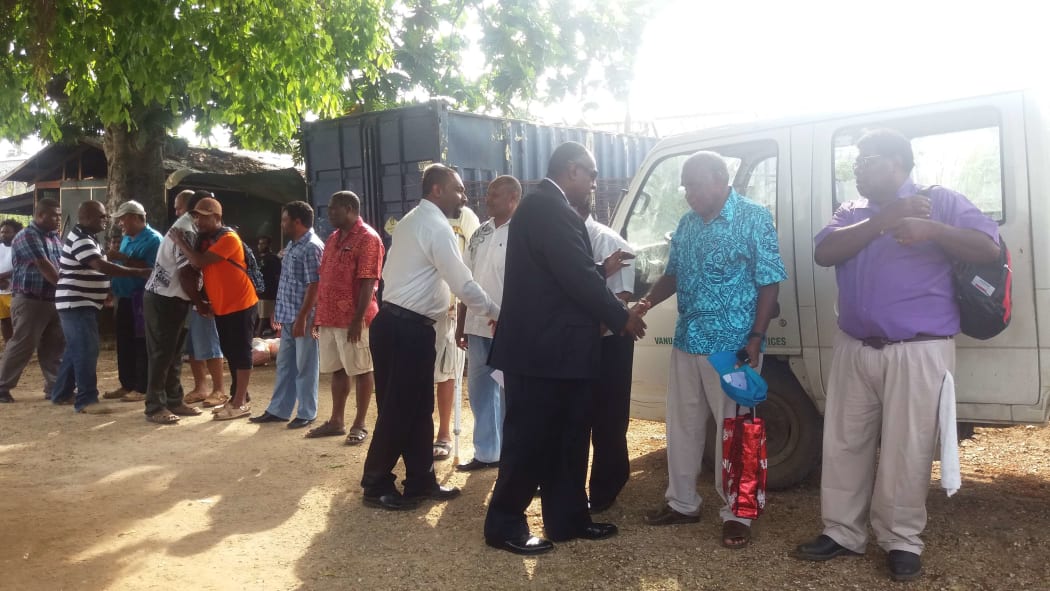 Vanuatu's Leader of Opposition, Director of Correction Services and Correction Staff farewell ten former MPs released on parole from prison after serving half of their sentences for a bribery conviction.