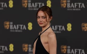 US actress Emma Stone poses on the red carpet upon arrival at the BAFTA British Academy Film Awards at the Royal Festival Hall, Southbank Centre, in London, on February 22, 2026.