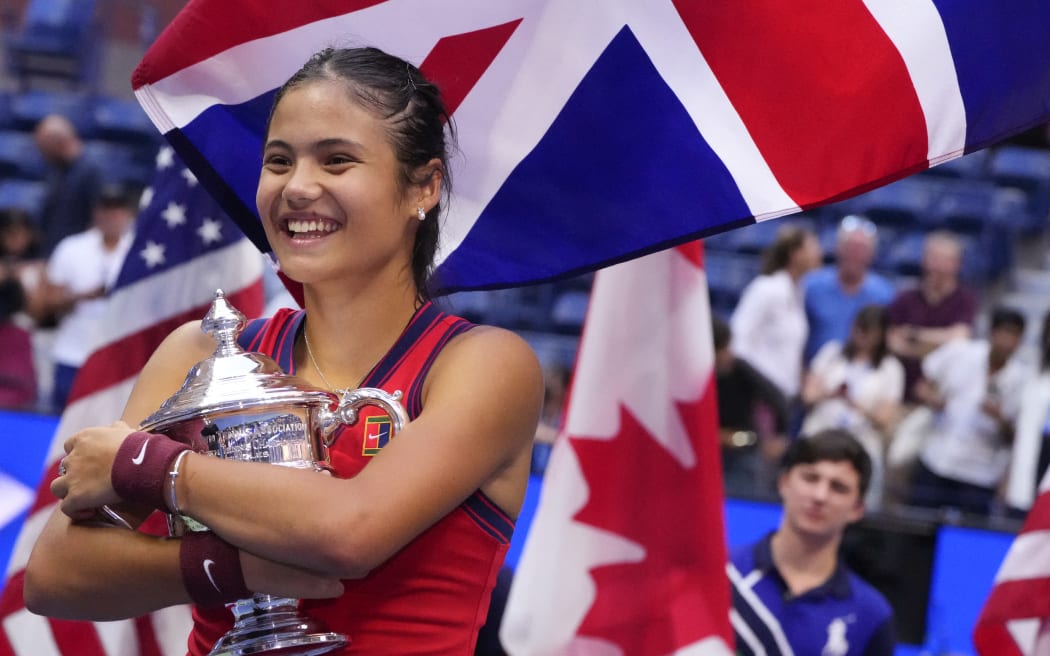 Britain's Emma Raducanu celebrates with the trophy after winning the 2021 US Open Tennis tournament women's final match against Canada's Leylah Fernandez, in September 2021