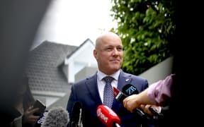 Christopher Luxon speaks to media outside his home in Auckland on 22 November