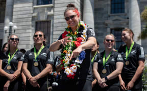 Fans celebrate the Black Ferns at an event at Parliament