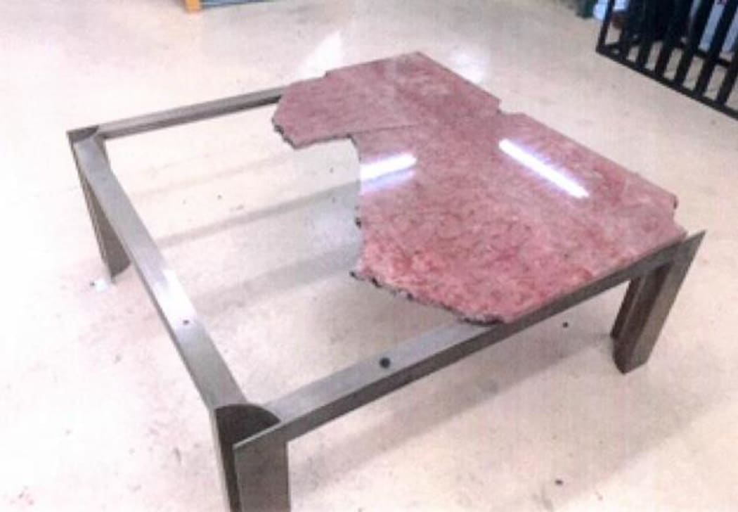 The smashed marble table.
