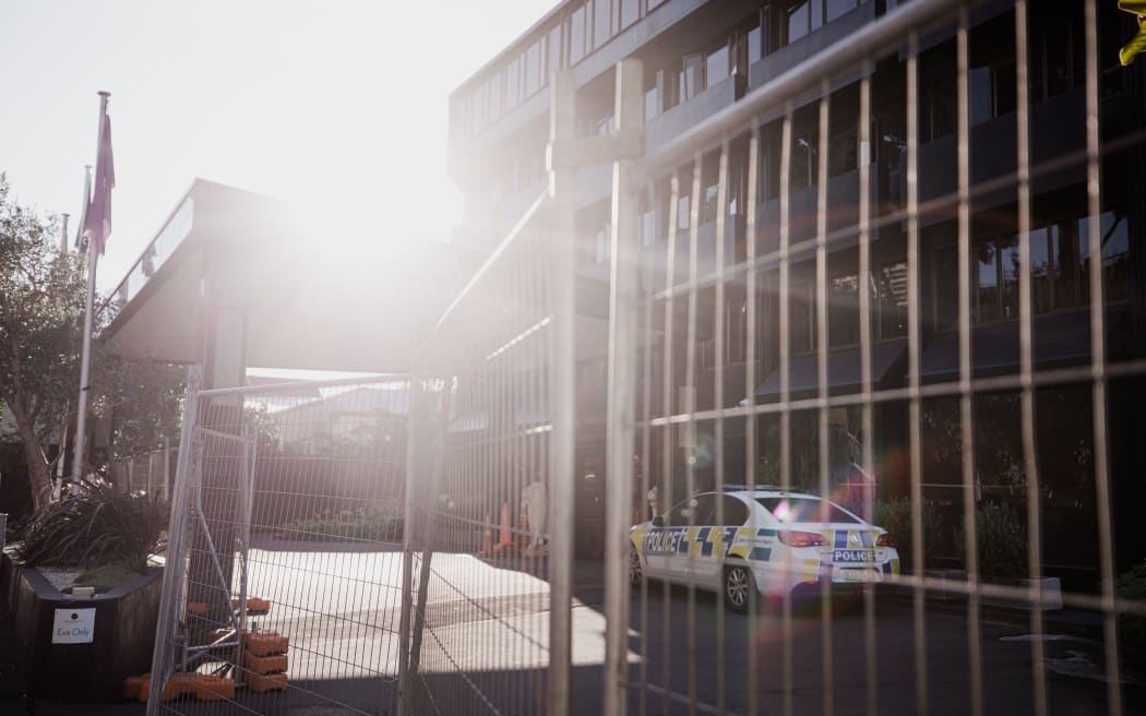 Police at the Grand Mecure Hotel in Wellington, which is being used as a managed isolation facility.