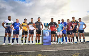 Super Rugby players pose for a photo at the Super Rugby Pacific 2026 Season Launch.
L-R: Patrick Tuipulotu (Blues), Nic Dolly (Western Force), Du’Plessis Kirifi (Hurricanes), Tom Wright (ACT Brumbies), Wallace Sititi (Chiefs), Codie Taylor (Crusaders), Patrick Pelligrini (Moana Pasifika), Manasa Mataele (Fijian Drua), Fraser McReight (Queensland Reds), Fabian Holland (Highlanders) and Eamon Doyle (NSW Waratahs).