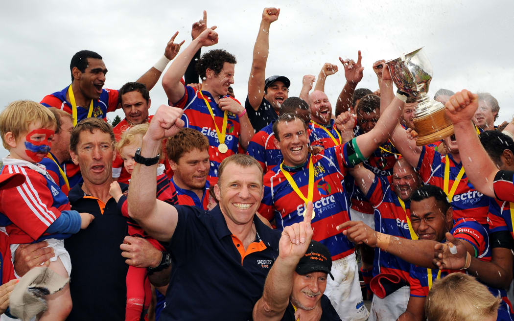 Buller team celebrate winning the Heartland championship Lochore Cup Final. Buller v South Canterbury. Victoria Square, Westport.