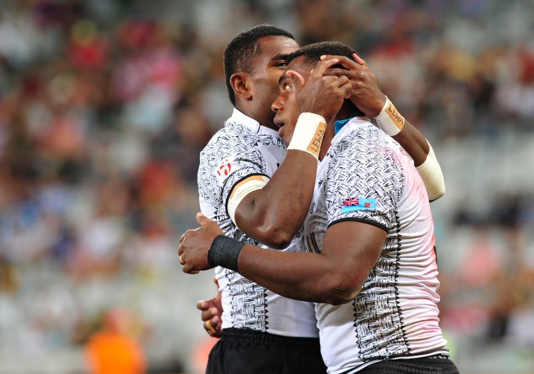 Captain Kalione Nasoko celebrates with Apenisa Cakaubalavu during the Cape Town Sevens in December.