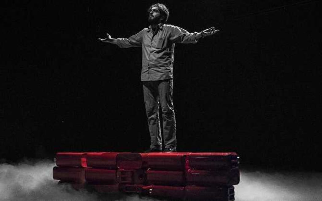 The actor playing the role of Behrouz Boochani in the play, Manus.