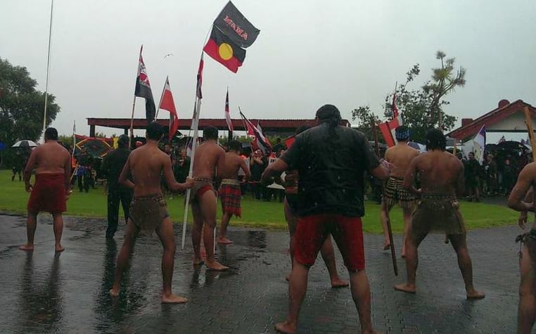 About 200 anti-TPP protesters are welcomed onto Te Tii Marae in Waitangi.