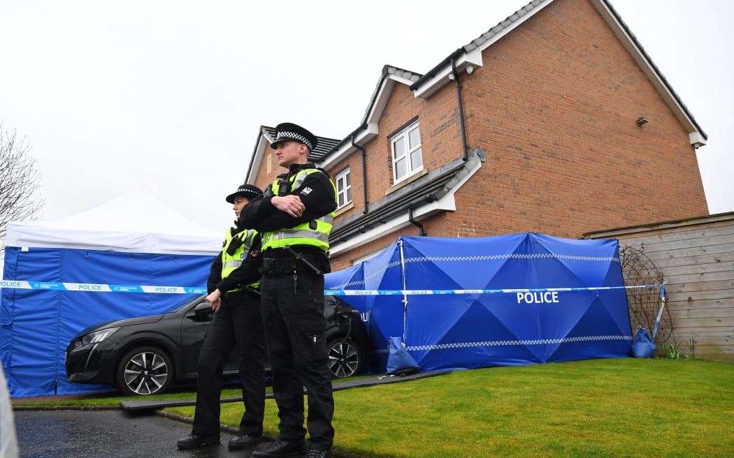 Police officers outside the home of Peter Murrell, former chief executive of the Scottish National Party (SNP), and his wife, Scotland's former First Minister and former leader of the SNP, Nicola Sturgeon, in Glasgow on April 5, 2023.
