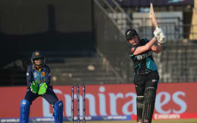 Georgia Plimmer drives during the White Ferns' match against Sri Lanka at the Women's T20 World Cup in Sharjah, October 2024.