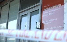 The damaged door of Prime Minister Jacinda Ardern's electorate office in the Auckland suburb of Morningside.