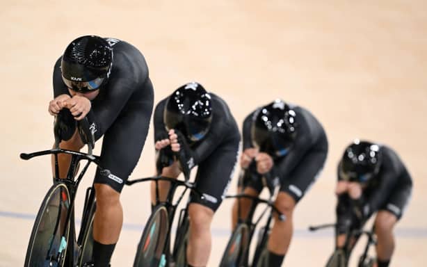 New Zealand’s Nicole Shields, New Zealand’s Emily Shearman, New Zealand’s Bryony Botha and New Zealand’s Ally Wollaston compete in a women’s track cycling team pursuit first round of the Paris 2024 Olympic Games at the Saint-Quentin-en-Yvelines National Velodrome in Montigny-le-Bretonneux, south-west of Paris, on August 7, 2024. (Photo by SEBASTIEN BOZON / AFP)