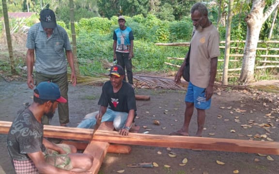 Indigenous Papuans in Merauke district protest to protect their customary lands. Crosses have been used as a protest symbol since 2010 when the Indonesian government launched the Merauke Integrated Food and Energy Estate project.