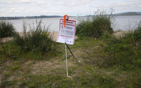 A sign warning the public of a wastewater spill at Ngongotahā, Rotorua, last week.