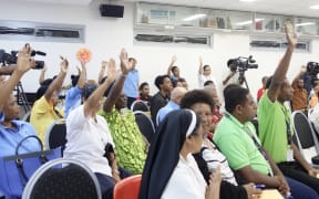 Participants vote on statement imploring Australia to act over Manus refugees