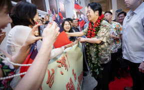 Taiwan (Republic of China) President Lai Ching-te is greeted by the Taiwanese community in Guam at Hyatt Regency Hotel lobby shortly after his arrival on Wednesday, 4 December 2024.