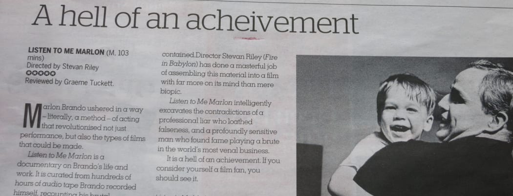 Magazine headline spelling 'achievement' incorrectly