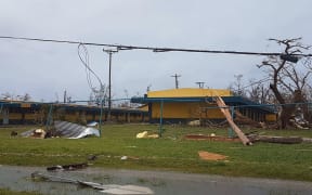 A school building is damaged after Super Typhoon Yutu