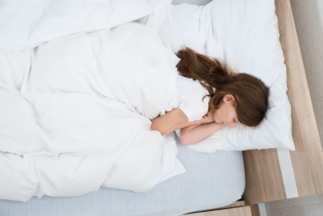 Teenager in bed