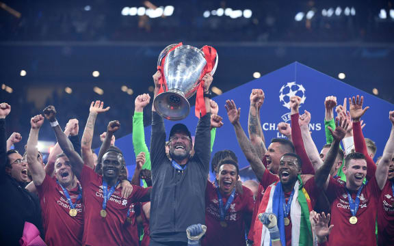 Liverpool manager Jurgen Klopp celebrates with Champions League trophy