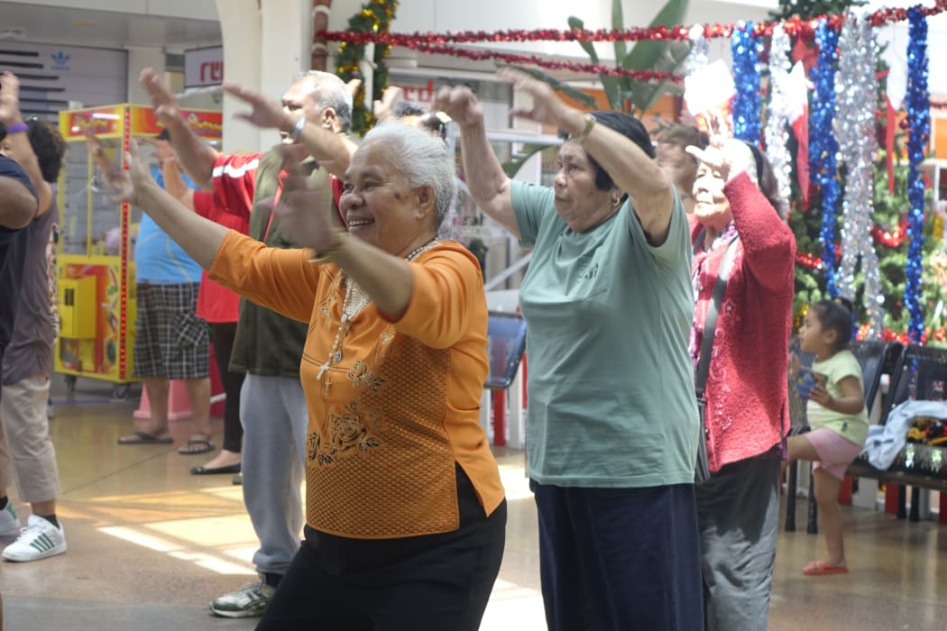 A mid-day Zumba class kicks off in Mangere’s town centre with participants excited for the fight this weekend.