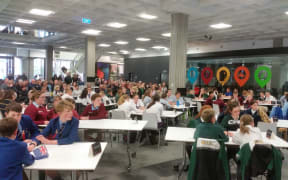 Sixty-four children with fingers at the ready battle it out in the Kids' Lit Quiz.