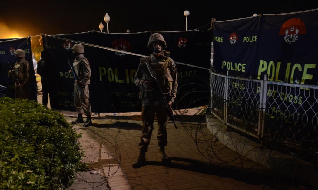 Security forces at the explosion site after a suicide bomber blew himself up in a crowded park in Lahore on Easter Sunday.