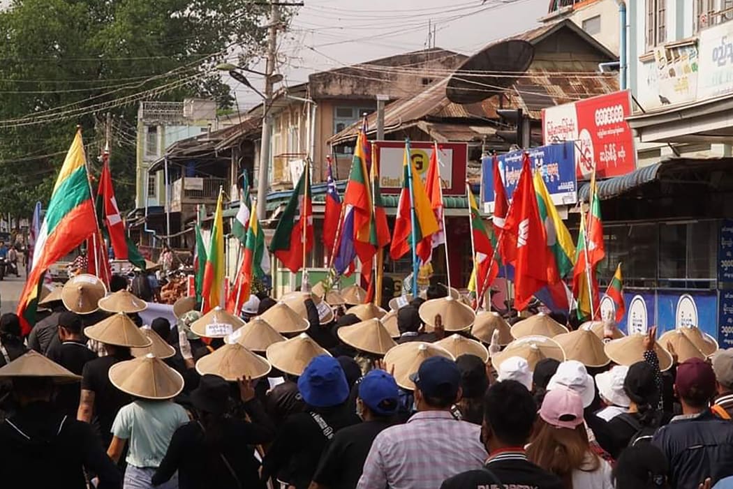 This handout from Shwe Phee Myay News Agency taken and released on May 2, 2021 shows protesters taking part in a demonstration against the military coup on "Global Myanmar Spring Revolution Day" in