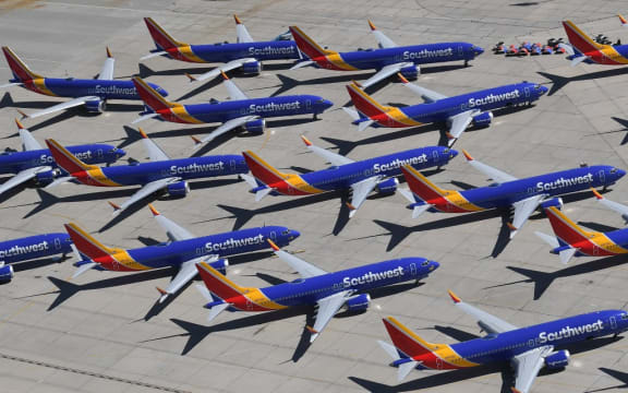 (FILES) In this file photo taken on March 28, 2019 Southwest Airlines Boeing 737 MAX aircraft are parked on the tarmac after being grounded, at the Southern California Logistics Airport in Victorville, California.