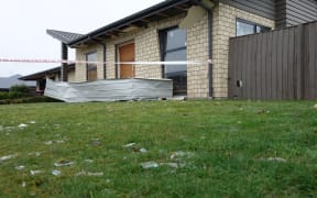 Damage from the explosion that destroyed a Marble Court home.