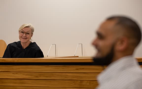 Judge Ema Aitken looks on as recovering drug addict and offender Mike graduates from the Drug Court in Auckland