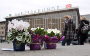 Flowers have been placed outside Cologne station, where the attacks happened.