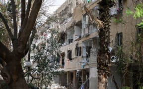 A building damaged during an Iranian strike in the Ramat Aviv area in Tel Aviv.