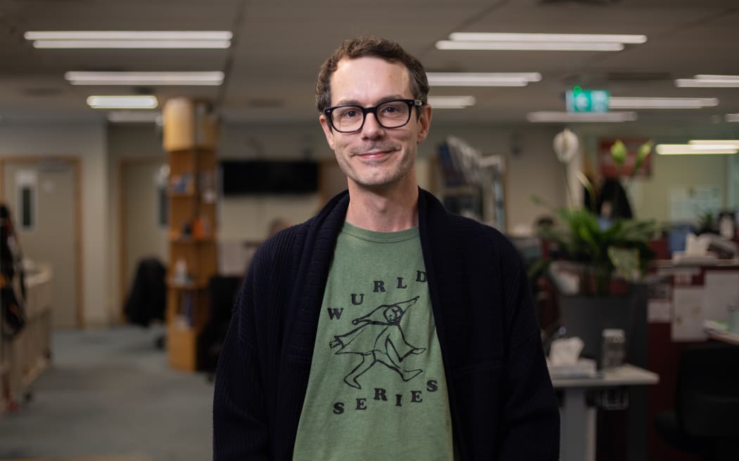 Tony Stamp wearing a 'Wurld Series' tee for NZ Music T-Shirt Day as part of New Zealand Music Month.