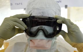 A health worker at an Ebola treatment center in Monrovia.