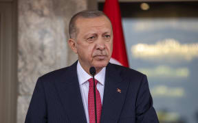 Turkish President Recep Tayyip Erdogan and President of Nigeria Muhammadu Buhari (not seen) hold a joint press conference after their meeting in Abuja, Nigeria on October 20, 2021.