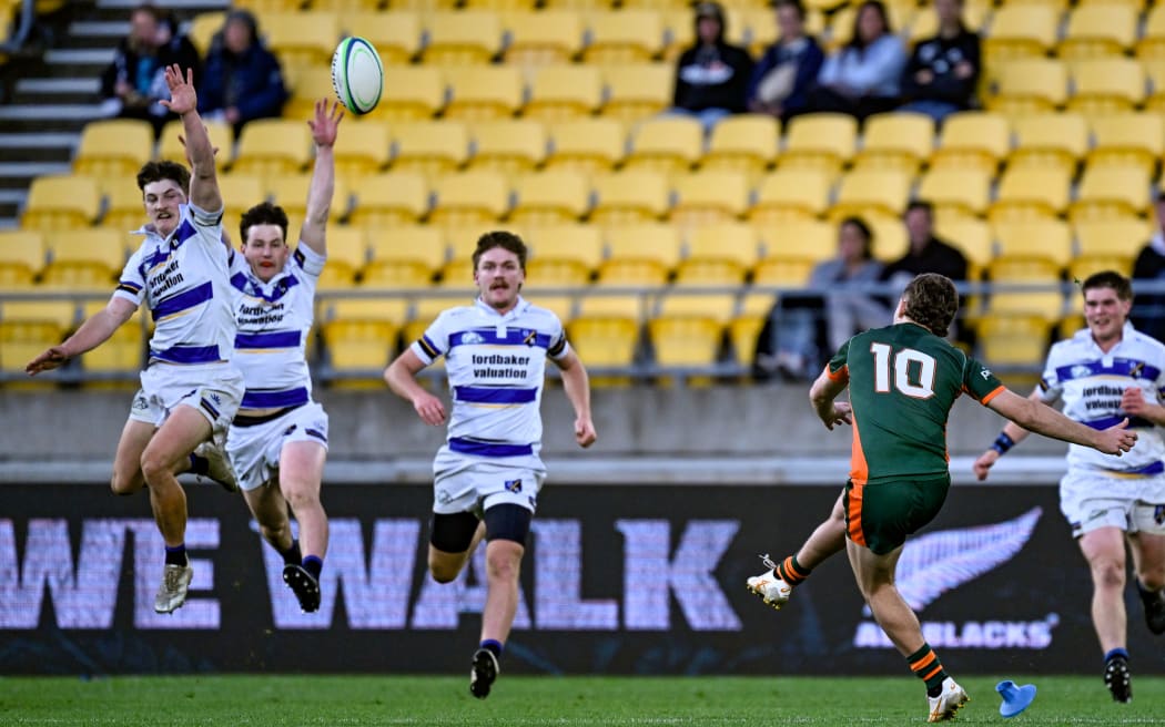 Riley Harrison of the Panthers kicks the winning conversion.
