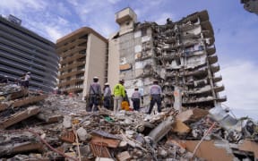 Search and rescue personnel work at the site of a collapsed Florida condominium complex in Surfside, Miami, US, on 3 July 2021.