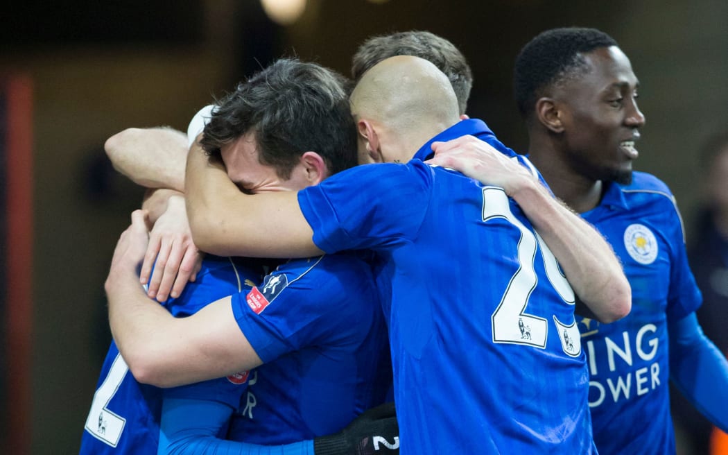 Leicester City players celebrate.