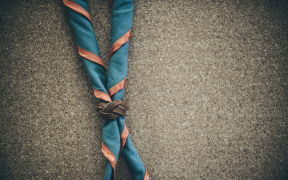 Orange,blue and yellow frame scout scarf. Concept is learning Scout subject.