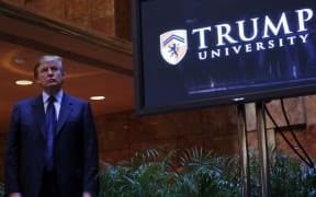 Donald Trump announces the establishment of Trump University in New York in May 2005.