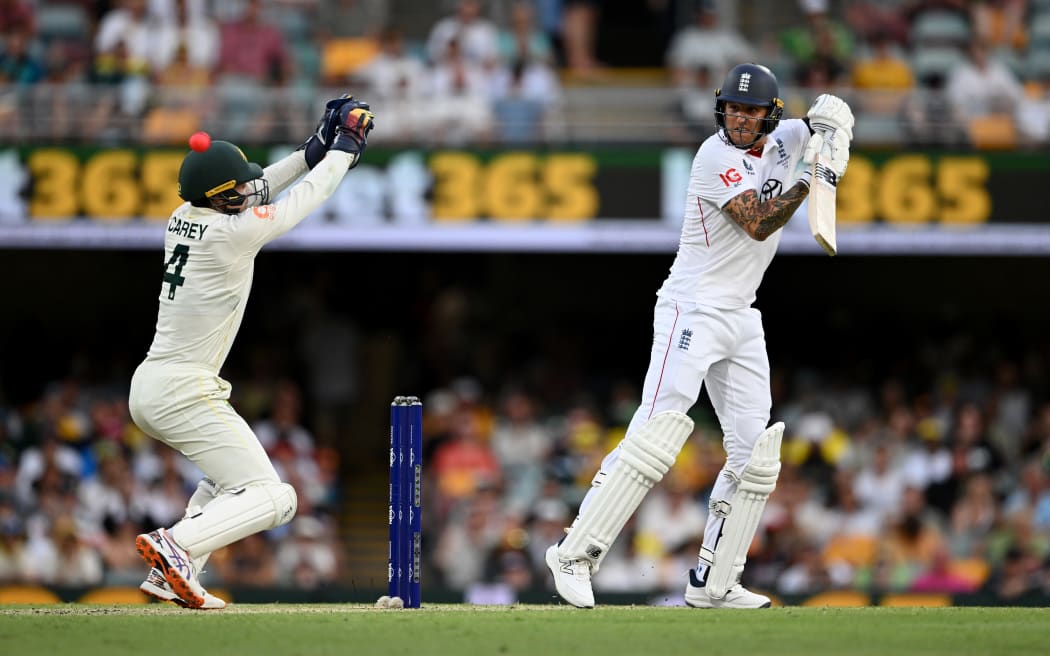 BRISBANE, AUSTRALIA - DECEMBER 07: Brydon Carse of England bats during day four of the Second 2025/26 Ashes Series Test Match between Australia and England at The Gabba on December 07, 2025 in Brisbane, Australia. (Photo by Gareth Copley/Getty Images)